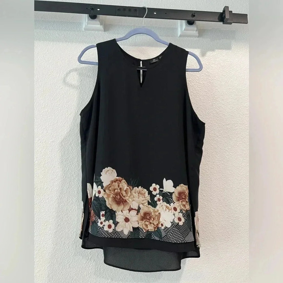Versona Tops - Versona loose fitting sleeveless top, black with fall color floral detail at hem